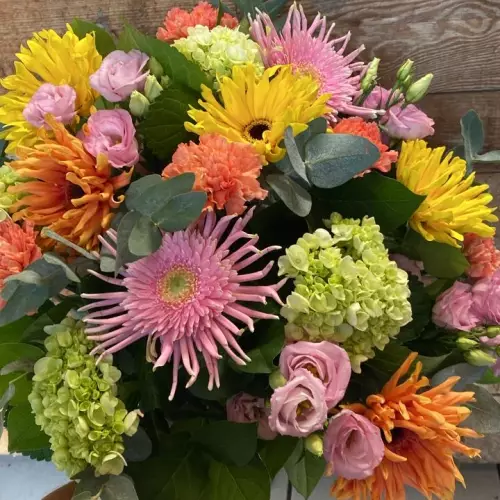 Bouquet coloré gerberas lisianthus œillets